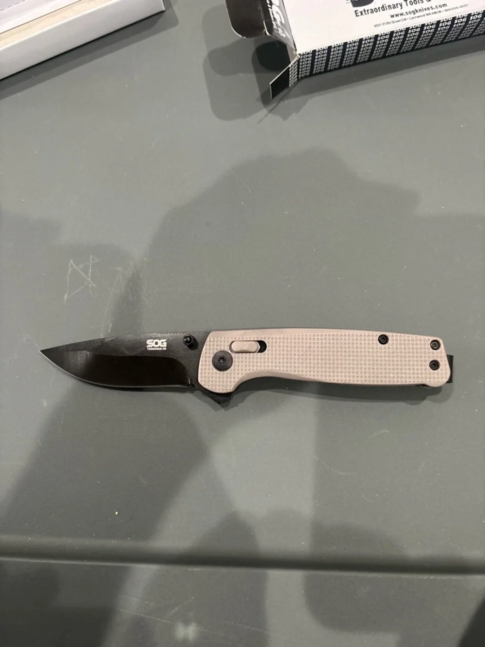 SOG Folding Pocket Knife - Tan Handle, Black Blade - Picture 1 of 2